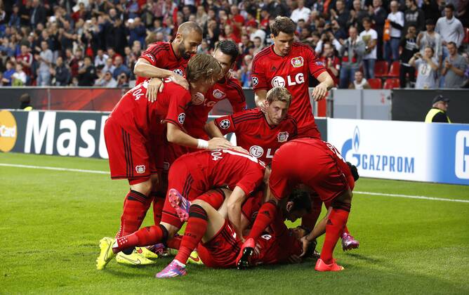 Leverkusens Heung-Min Son (m) celebrates scoring the 1:0 with teammates during the Championsleague Play-off match between Bayer 04 Leverkusen and FC Kopenhagen, Bayarena in Leverkusen on August 27., 2013. Bayer 04 Leverkusen vs. FC Kopenhagen in der Champions League Qualifikation der Saison 2014 2015 am 27. August 2014.