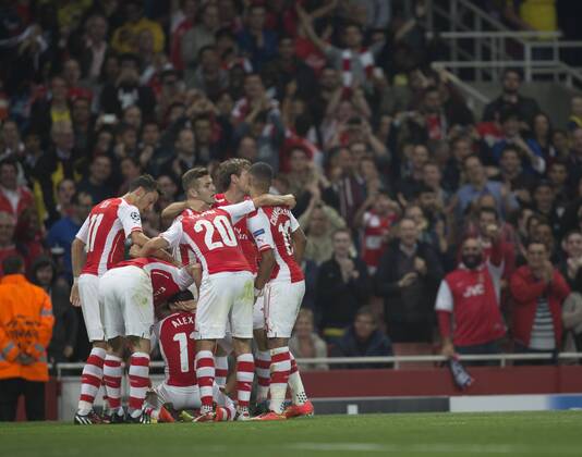27.08.2014. London, England. Champions League Qualifying 2nd Leg. Arsenal versus Besiktas. Arsenal players celebrate their opening goal. xNigelxCookex  ActionPlus20269066