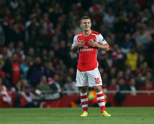 Arsenal s Jack Wilshere looks on dejected - UEFA Champions League, Play-off Second Leg - Emirates Stadium - England - 27th August 2014 - Picture David Klein Sportimage EDITORIAL USE ONLY. No use with unauthorised audio, video, data, fixture lists, club league logos or live services. Online in-match use limited to 120 images, no video emulation. No use in betting, games or single club league player publications.