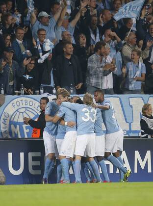 SOCCER - CL, Malmoe vs RBS MALMOE,SWEDEN,27.AUG.14 - SOCCER - UEFA Champions League, play off, Malmoe FF vs Red Bull Salzburg. Image shows the rejoicing of Malmoe. 