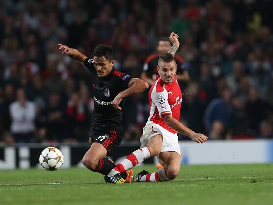 Arsenal s Mathieu Debuchy gets sent off for this tackle on Besiktas Mustafa Pektemek - UEFA Champions League, Play-off Second Leg - Emirates Stadium - England - 27th August 2014 - Picture David Klein Sportimage EDITORIAL USE ONLY. No use with unauthorised audio, video, data, fixture lists, club league logos or live services. Online in-match use limited to 120 images, no video emulation. No use in betting, games or single club league player publications.