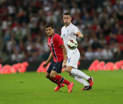 England s Gary Cahill tussles with Norway s Tarik El Younoussi - International Friendly - England Vs Norway - Wembley Stadium - England - 3rd September 2014 - Picture David Klein Sportimage EDITORIAL USE ONLY. No use with unauthorised audio, video, data, fixture lists, club league logos or live services. Online in-match use limited to 120 images, no video emulation. No use in betting, games or single club league player publications.