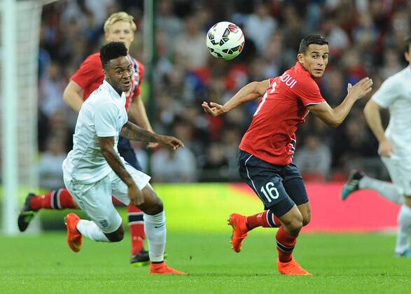 Football - 2014 2015 International Friendly - England vs. Norway England s Raheem Sterling and Norway s Omar Elabdellaoui at Wembley. COLORSPORT ANDREW COWIE 