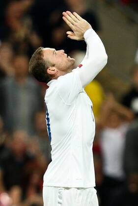 England s Wayne Rooney celebrates his goal - England v Norway - International Friendly - Wembley Stadium - London - 3rd September 2014 - Pic Charlie Forgham-Bailey Sportimage EDITORIAL USE ONLY. No use with unauthorised audio, video, data, fixture lists, club league logos or live services. Online in-match use limited to 120 images, no video emulation. No use in betting, games or single club league player publications.