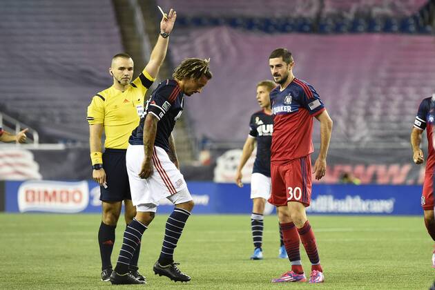 Sept. 7, 2014 - Foxborough, Massachusetts, USA - September 7, 2014 - Foxborough, Massachusetts, U.S. - Chicago Fire Razvan Cocis (30) receives a yellow card warning for a foul on New England Revolution s Jermaine Jones (13) during the MLS Fussball Herren USA game between Chicago Fire and the New England Revolution held at Gillette Stadium in Foxborough Massachusetts. Eric Canha CSM MLS Fussball Herren USA 2014: Fire vs Revolution SEP 07 - ZUMAc04