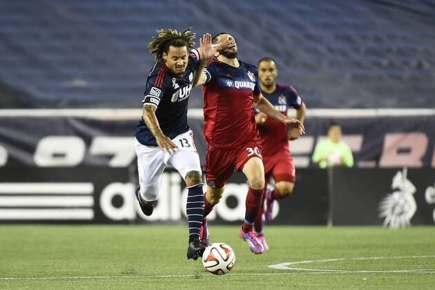 Sept. 7, 2014 - Foxborough, Massachusetts, USA - September 7, 2014 - Foxborough, Massachusetts, U.S. - New England Revolution s Jermaine Jones (13) and Chicago Fire midfielder Razvan Cocis (30) in game action during the MLS Fussball Herren USA game between Chicago Fire and the New England Revolution held at Gillette Stadium in Foxborough Massachusetts. The Revolution beat the Fire 2-1. Eric Canha CSM MLS Fussball Herren USA 2014: Fire vs Revolution SEP 07 - ZUMAc04