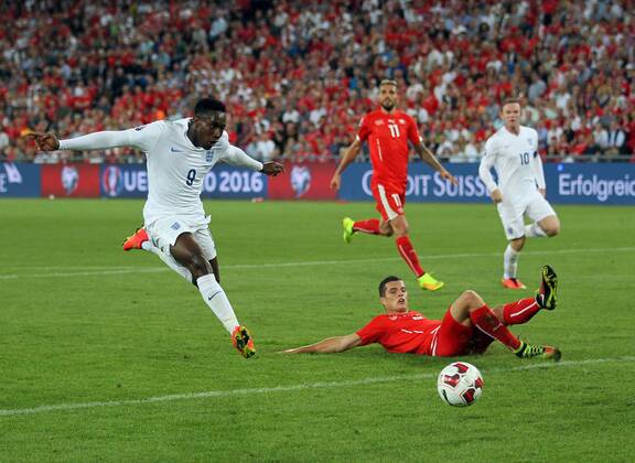 England s Danny Welbeck scoring his sides opening goal - Euro 2016 Qualifier Group E - Switzerland Vs England - St Jakob Park - Switzerland - 8th September 2014 - Picture David Klein Sportimage EDITORIAL USE ONLY. No use with unauthorised audio, video, data, fixture lists, club league logos or live services. Online in-match use limited to 120 images, no video emulation. No use in betting, games or single club league player publications.