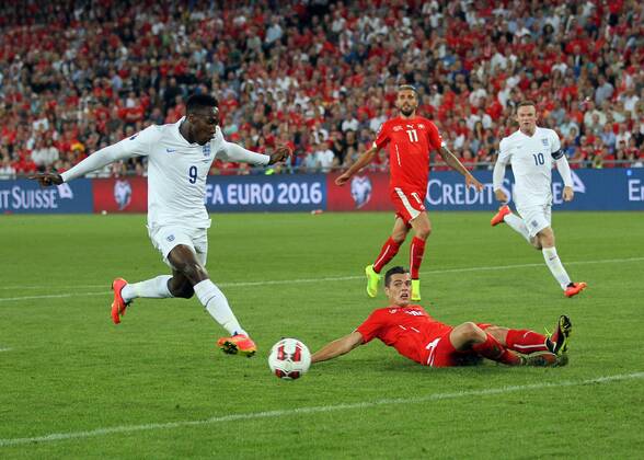 England s Danny Welbeck scoring his sides opening goal - Euro 2016 Qualifier Group E - Switzerland Vs England - St Jakob Park - Switzerland - 8th September 2014 - Picture David Klein Sportimage EDITORIAL USE ONLY. No use with unauthorised audio, video, data, fixture lists, club league logos or live services. Online in-match use limited to 120 images, no video emulation. No use in betting, games or single club league player publications.