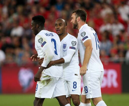 England s Fabian Delph celebrates with goalscorere Danny Welbeck - Euro 2016 Qualifier Group E - Switzerland Vs England - St Jakob Park - Switzerland - 8th September 2014 - Picture David Klein Sportimage EDITORIAL USE ONLY. No use with unauthorised audio, video, data, fixture lists, club league logos or live services. Online in-match use limited to 120 images, no video emulation. No use in betting, games or single club league player publications.