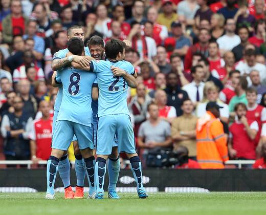 Manchester City s Martin Demichelis celebrates scoring his sides second goal - Barclays Premier League - FC Arsenal London v Manchester City - Emirates Stadium - England - 13th September 2014 -EDITORIAL USE ONLY. No use with unauthorised audio, video, data, fixture lists, club league logos or live services. Online in-match use limited to 120 images, no video emulation. No use in betting, games or single club league player publications.