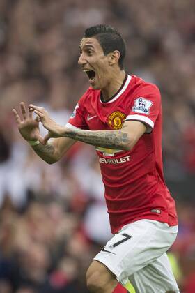 Angel di Maria of Manchester United celebrates his opening goal - Manchester United vs. QPR - Barclay s Premier League - Old Trafford - Manchester - 13 09 2014 Pic Philip Oldham Sportimage EDITORIAL USE ONLY. No use with unauthorised audio, video, data, fixture lists, club league logos or live services. Online in-match use limited to 120 images, no video emulation. No use in betting, games or single club league player publications.