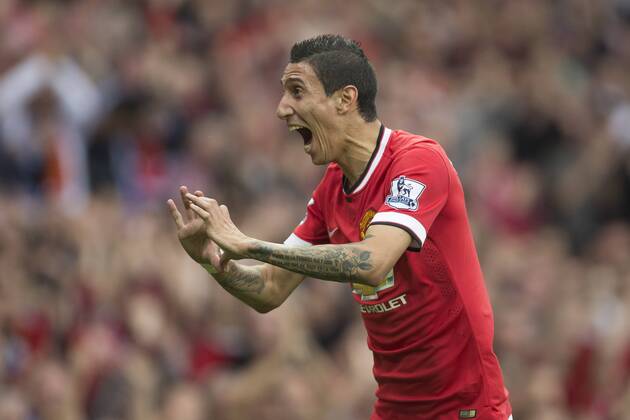Angel di Maria of Manchester United celebrates his opening goal - Manchester United vs. QPR - Barclay s Premier League - Old Trafford - Manchester - 13 09 2014 Pic Philip Oldham Sportimage EDITORIAL USE ONLY. No use with unauthorised audio, video, data, fixture lists, club league logos or live services. Online in-match use limited to 120 images, no video emulation. No use in betting, games or single club league player publications.