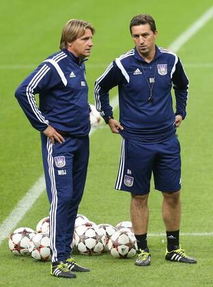 Anderlecht s keeper trainer Max de Jong and Anderlecht s head coach Besnik Hasi pictured during a training session of Belgian soccer team RSC Anderlecht in the Tuk Telekom Arena in Istanbul, Monday 15 September 2014. VIRGINIExLEFOUR  premiumd 22008