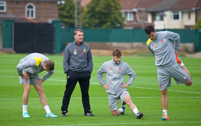 PROPAGANDA20140915 Football - soccer: UEFA Champions League, Liverpool FC , Liverpool s manager Brendan Rodgers with Jordan Henderson, Adam Lallana and Dejan Lovren during training at Melwood .xHOCHxZWEIx xPropagandax 