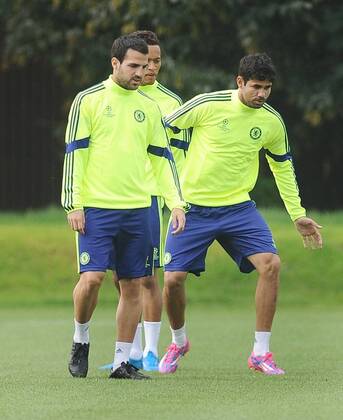 Football - 2014 2015 Champions League - Chelsea training pre. Schalke Chelsea s Cesc Fabregas and Diego Costa at Cobham Training Ground. COLORSPORT ANDREW COWIE 