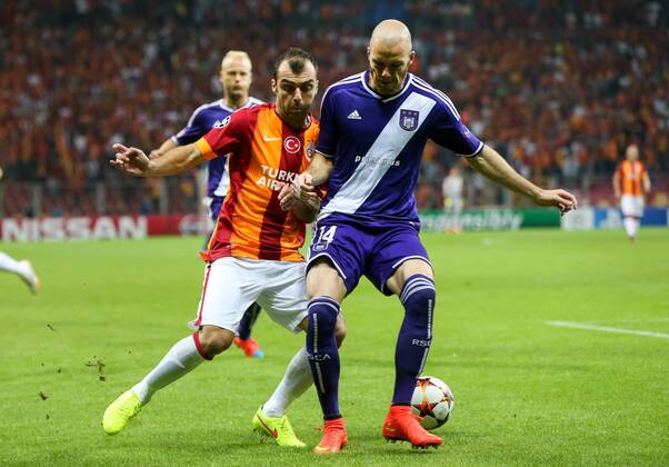 ISTANBUL - Galatasaray s Goran Pandev and Anderlecht s Bram Nuytinck fight for the ball during a soccer game between Turkish team Galatasaray S.K. and Belgian team RSC Anderlecht in the Tuk Telekom Arena in Istanbul, Turkey, Tuesday 16 September 2014, on day 1 of the group stage of the UEFA Champions League competition, in group D. VIRGINIExLEFOUR  premiumd Highlight 04316847