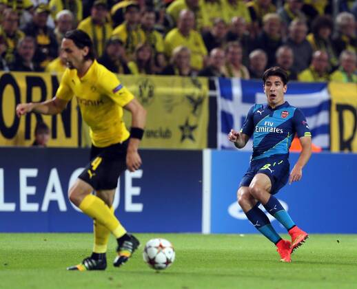 Arsenal s Hector Bellerin in action - Champions League Group D - Borussia Dortmund vs Arsenal London - Signal Iduna Park - Germany - 16th September 2014 - EDITORIAL USE ONLY. No use with unauthorised audio, video, data, fixture lists, club league logos or live services. Online in-match use limited to 120 images, no video emulation. No use in betting, games or single club league player publications.