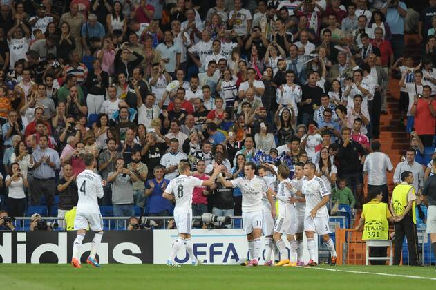 Real Madrid Defender, Jose I. Fernandez Iglesias - NACHO, number 18 celebrates after scoring a goal (0,0). Real Madrid Defender, Kepler Laveran Lima Ferreira - PEPE, number 3. Real Madrid Defender, Sergio Ramos Garcia - SERGIO RAMOS, number 4. Real Madrid Midfielder, Toni Kroos - KROOS, number 8. Real Madrid Midfielder, Gareth Frank Bale - BALE, number 11. Round 1 of the CHAMPIONS league, soccer match between Real Madrid - FC Basel at the Santiago Bernabeu estadium, Madrid - Spain by September 16, 2014.