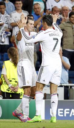 Real Madrid - FC Basel. Gareth Bale and Cristiano Ronaldo celebrate after scoring 