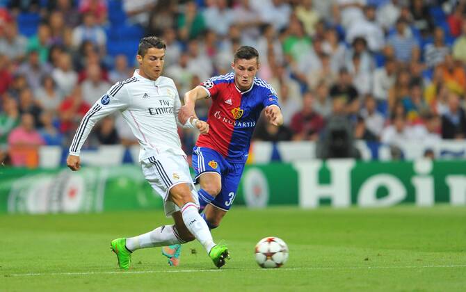 16.09.2014, Fussball, Champions League, Real Madrid - FC Basel, v.l. Cristiano Ronaldo (Real Madrid) - Taulant Xhaka (FC Basel)