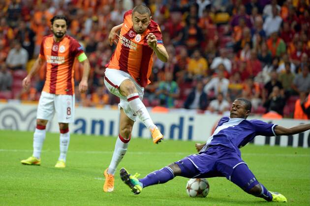 Burak Yilmaz of Galatasaray and Chancel Mbemba of RSC Anderlecht Galatasaray Istanbul vs RSC Anderlecht PhotoNewsxPanoramic 