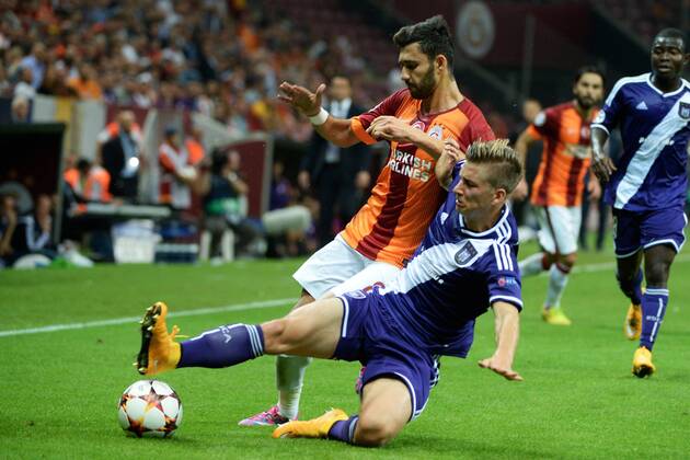 Veysel San of Galatasaray and Dennis Praet of RSC Anderlecht Galatasaray Istanbul vs RSC Anderlecht PhotoNewsxPanoramic 