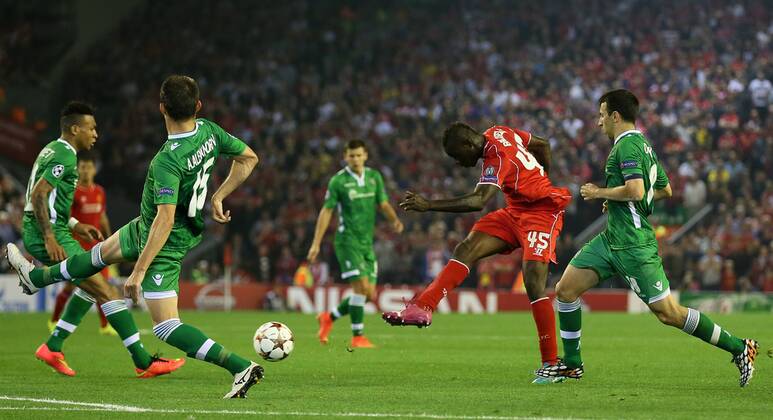 Mario Balotelli of Liverpool fires in a shot - UEFA Champions League Group B - Liverpool vs Ludogorets Razgrad - Anfield Stadium - Liverpool - England - 16th September 2014 - Picture Simon Bellis Sportimage EDITORIAL USE ONLY. No use with unauthorised audio, video, data, fixture lists, club league logos or live services. Online in-match use limited to 120 images, no video emulation. No use in betting, games or single club league player publications.