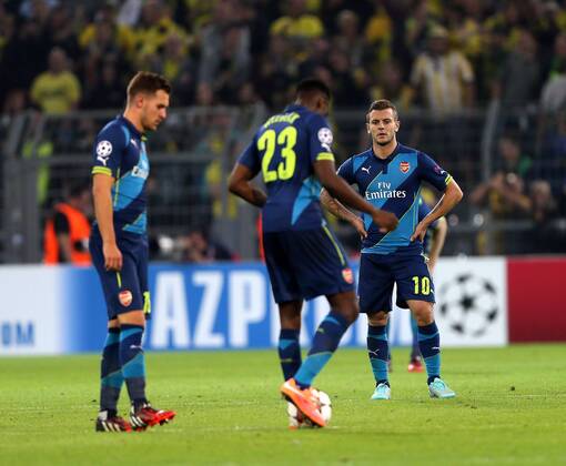 Arsenal s Jack Wilshere looks on dejected after Dortmund s second goal - Champions League Group D - Borussia Dortmund vs Arsenal London - Signal Iduna Park - Germany - 16th September 2014 - EDITORIAL USE ONLY. No use with unauthorised audio, video, data, fixture lists, club league logos or live services. Online in-match use limited to 120 images, no video emulation. No use in betting, games or single club league player publications.