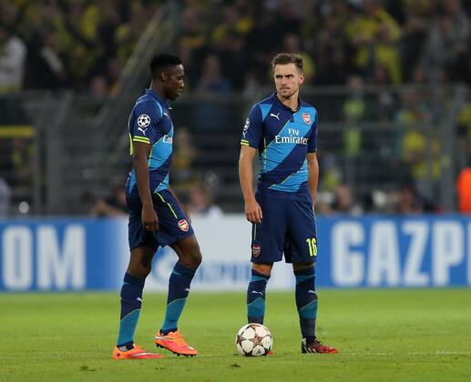 Arsenal s Aaron Ramsey and Danny Welbeck look on dejected after Dortmund s second goal - Champions League Group D - Borussia Dortmund vs Arsenal London - Signal Iduna Park - Germany - 16th September 2014 - EDITORIAL USE ONLY. No use with unauthorised audio, video, data, fixture lists, club league logos or live services. Online in-match use limited to 120 images, no video emulation. No use in betting, games or single club league player publications.