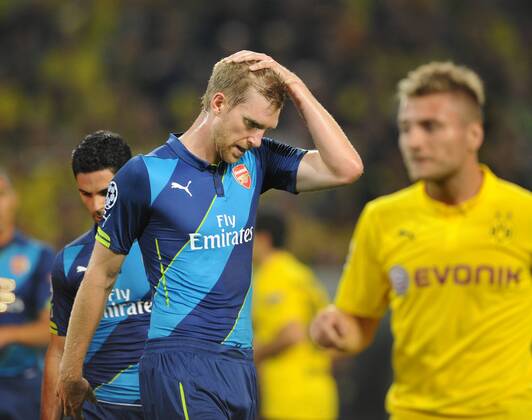 Championsleague: Borussia Dortmund - Arsenal London 16.09.2014. Per Mertesacker (Arsenal) enttäuscht. HM