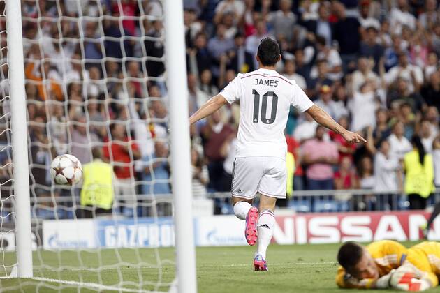 James Rodriguez of Real Madrid and Tomas Vaclik of FC Basel 1893 during the Champions League group B soccer match between Real Madrid and FC Basel 1893 at Santiago Bernabeu Stadium in Madrid, Spain. September 16, 2014.  (20423558)
