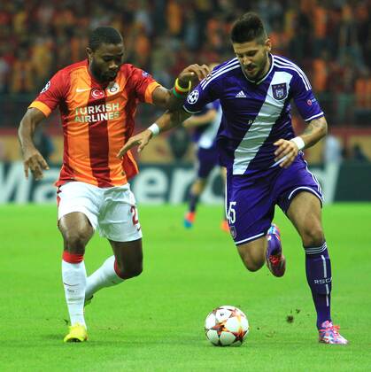 UEFA Champions League Group D match between Galatasaray AS v RSC Anderlecht at Turk Telekom Arena in Istanbul, Turkey on September 16, 2014. Pictured: Aurelien Chedjou of Galatasaray and Aleksandar Mitrovic of Anderlecht. 