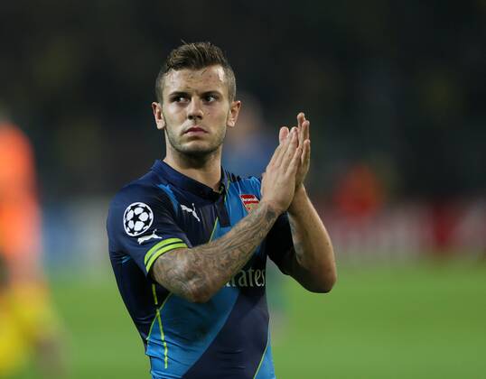 Arsenal s Jack Wilshere looks on dejected at the final whistle - Champions League Group D - Borussia Dortmund vs Arsenal London - Signal Iduna Park - Germany - 16th September 2014 - EDITORIAL USE ONLY. No use with unauthorised audio, video, data, fixture lists, club league logos or live services. Online in-match use limited to 120 images, no video emulation. No use in betting, games or single club league player publications.