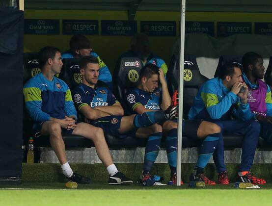 Arsenal s Meust Ozil looks on dejected after being substituted - Champions League Group D - Borussia Dortmund vs Arsenal London - Signal Iduna Park - Germany - 16th September 2014 - EDITORIAL USE ONLY. No use with unauthorised audio, video, data, fixture lists, club league logos or live services. Online in-match use limited to 120 images, no video emulation. No use in betting, games or single club league player publications.