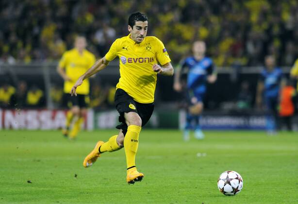 Fussball, UEFA Champions League, Herren, Saison 2014 2015, Gruppe D, 1. Spieltag, Signal Iduna Park Dortmund, Bor. Dortmund, BVB (gelb) - Arsenal London (blau) 2:0; Henrikh Mkhitaryan (BVB). Aktion, Einzelbild, Freisteller.