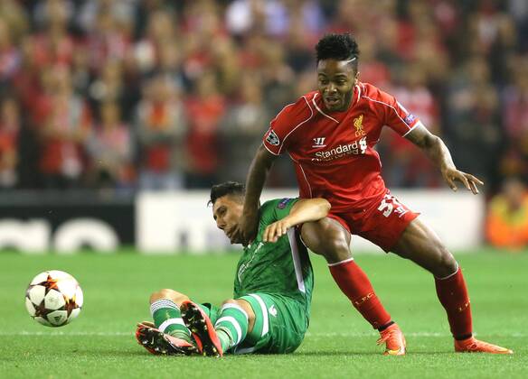 Raheem Sterling of Liverpool tussles with Mihail Aleksandrov of Ludogorets - UEFA Champions League Group B - Liverpool vs Ludogorets Razgrad - Anfield Stadium - Liverpool - England - 16th September 2014 - EDITORIAL USE ONLY. No use with unauthorised audio, video, data, fixture lists, club league logos or live services. Online in-match use limited to 120 images, no video emulation. No use in betting, games or single club league player publications.