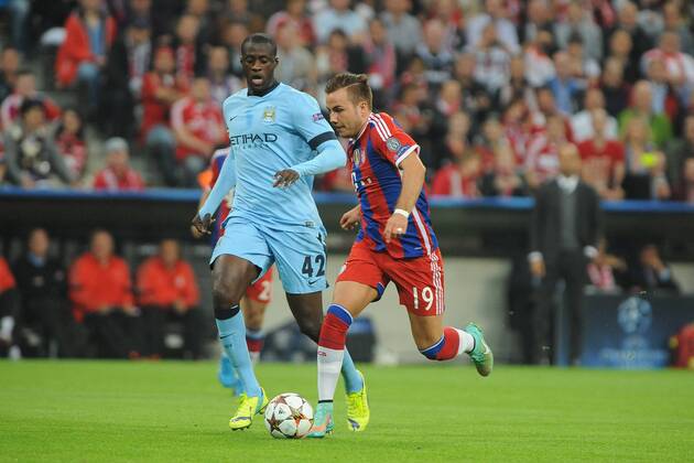 vl Yaya Toure (Manchester City) und Mario Goetze (FC Bayern München) FC Bayern München - Manchester City, Fussball, Champions - League, Vorrunde, Spieltag 1,17.09.2014,