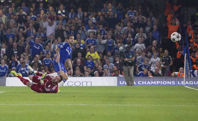 Cesc Fabregas of Chelsea scores the first goal - Chelsea vs. Schalke 04 - UEFA Champions League - Stamford Bridge - London - 17 09 2014 Pic Philip Oldham Sportimage EDITORIAL USE ONLY. No use with unauthorised audio, video, data, fixture lists, club league logos or live services. Online in-match use limited to 120 images, no video emulation. No use in betting, games or single club league player publications.