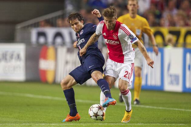 (L-R) Maxwell of Paris Saint-Germain, Lasse Schone of Ajax during the UEFA Champions League group F match between Ajax Amsterdam and Paris Saint-Germain on September 17, 2014 at the Amsterdam Arena in Amsterdam, The Netherlands. Ajax Amsterdam v PSG UEFA Champions League Group F 2014 2015 xVIxxIVx 2655026