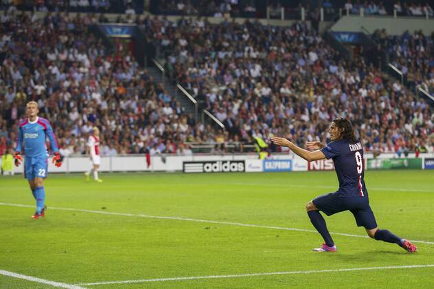 (L-R) of Ajax, Nicolai Boilesen of Ajax, Edinson Cavani of Paris Saint-Germain during the UEFA Champions League group F match between Ajax Amsterdam and Paris Saint-Germain on September 17, 2014 at the Amsterdam Arena in Amsterdam, The Netherlands. Ajax Amsterdam v PSG UEFA Champions League Group F 2014 2015 xVIxxIVx 2655059