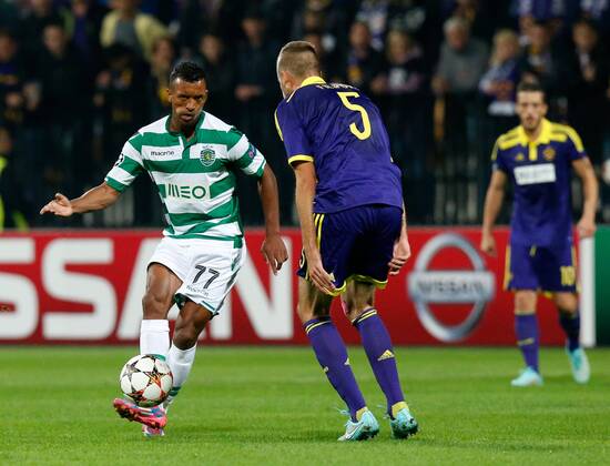 SOCCER - CL, Maribor vs Sporting MARIBOR,SLOVENIA,17.SEP.14 - SOCCER - UEFA Champions League, group stage, NK Maribor vs Sporting Clube de Portugal. Image shows Nani (Sporting) and Zeljko Filipovic (Maribor). 
