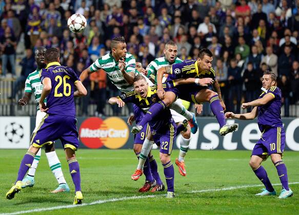 SOCCER - CL, Maribor vs Sporting MARIBOR,SLOVENIA,17.SEP.14 - SOCCER - UEFA Champions League, group stage, NK Maribor vs Sporting Clube de Portugal. Image shows Aleksander Rajcevic (Maribor), Islam Slimani (Sporting), Dare Vrsic and Agim Ibraimi (Maribor). 