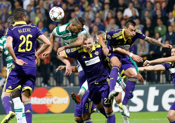 SOCCER - CL, Maribor vs Sporting MARIBOR,SLOVENIA,17.SEP.14 - SOCCER - UEFA Champions League, group stage, NK Maribor vs Sporting Clube de Portugal. Image shows Aleksander Rajcevic (Maribor), Islam Slimani (Sporting) and Nejc Potokar (Maribor) 