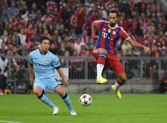 17.09.2014, Fussball, Saison 2014 15, UEFA Champions League, Vorrunde, FC Bayern München - Manchester City Mehdi Benatia (Bayern München), re., gegen Samir Nasri (Manchester City)