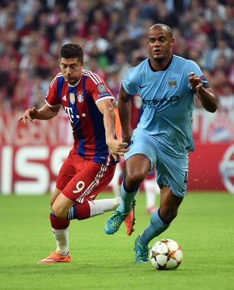 17.09.2014, xjhx, Fussball Champions League, FC Bayern München - Manchester City, v.l. Robert Lewandowski (FC Bayern München), Vincent Kompany (Manchester City FC)