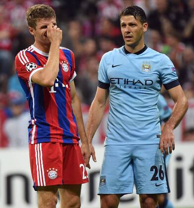 17.09.2014, xjhx, Fussball Champions League, FC Bayern München - Manchester City, v.l. Thomas Mueller (FC Bayern München), Martin Demichelis (Manchester City FC)