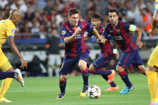 17.09.2014. Barcelona, Spain. Champions league Group F. Barcelona versus Apoel. Messi in action supported by Xavi in the attack xAngelxBoludax  ActionPlus19090424