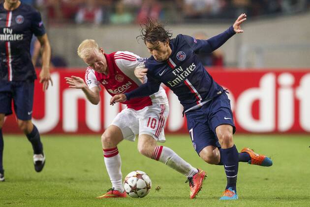 (L-R) Lasse Schone of Ajax, Maxwell of Paris Saint-Germain during the UEFA Champions League group F match between Ajax Amsterdam and Paris Saint-Germain on September 17, 2014 at the Amsterdam Arena in Amsterdam, The Netherlands. Ajax Amsterdam v PSG UEFA Champions League Group F 2014 2015 xVIxxIVx 2655320