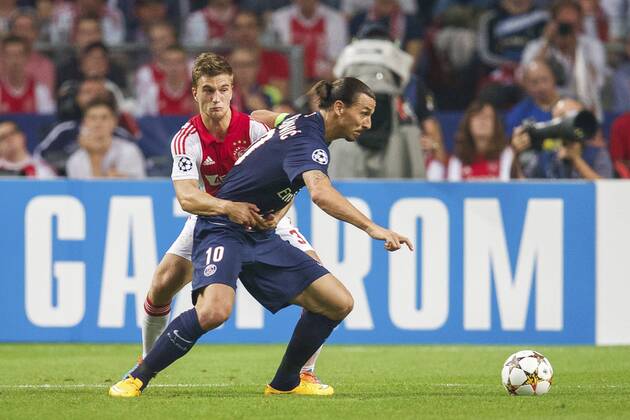 (L-R) Joel Veltman of Ajax, Zlatan Ibrahimovic of Paris Saint-Germain during the UEFA Champions League group F match between Ajax Amsterdam and Paris Saint-Germain on September 17, 2014 at the Amsterdam Arena in Amsterdam, The Netherlands. Ajax Amsterdam v PSG UEFA Champions League Group F 2014 2015 xVIxxIVx 2655417