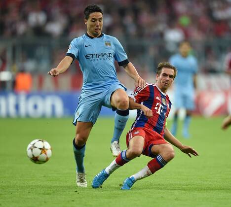FUSSBALL CHAMPIONS LEAGUE SAISON 2014 2015 Vorrunde FC Bayern München - Manchester City 17.09.2014 Philipp Lahm (re, FC Bayern München) gegen Samir Nasri (Manchester City) 